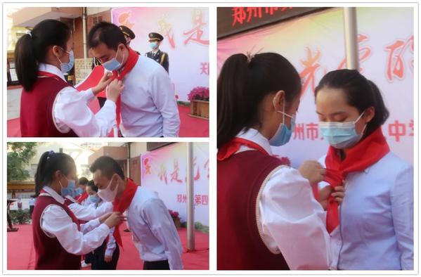 学生代表为辅导员老师戴上鲜艳的红领巾